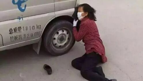 碰瓷者在车前躺下，不料女子一脚油门，车子直接压过去了