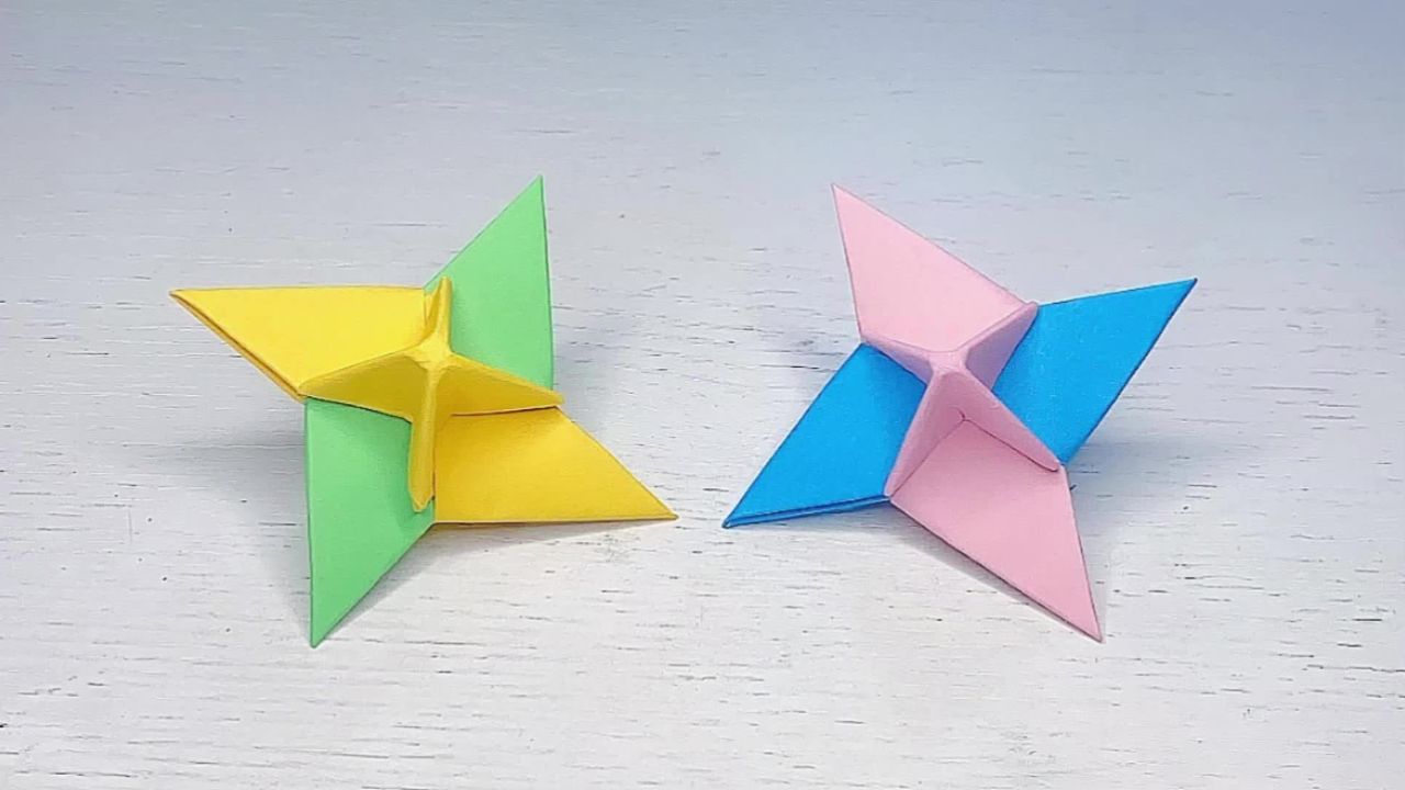 2张纸折纸陀螺的折法图片