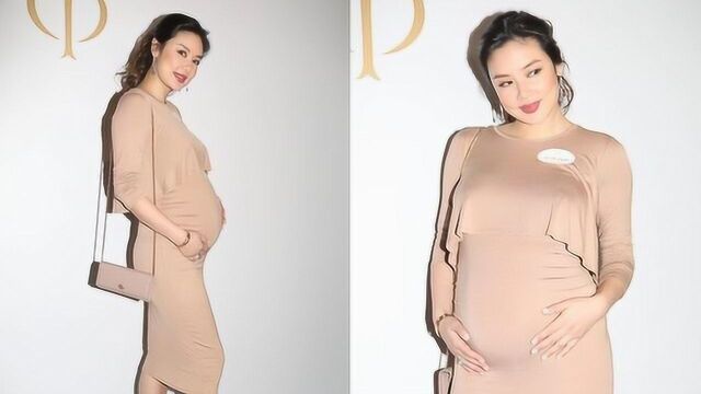 乐基儿挺着孕肚出席活动 曝自己有家族遗传病