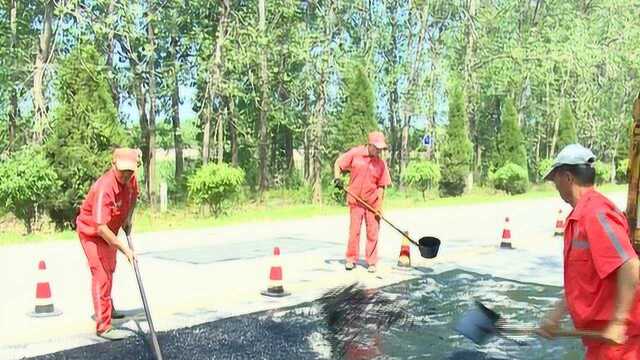 公路养护工:越热越忙 沥青地表温度超100℃