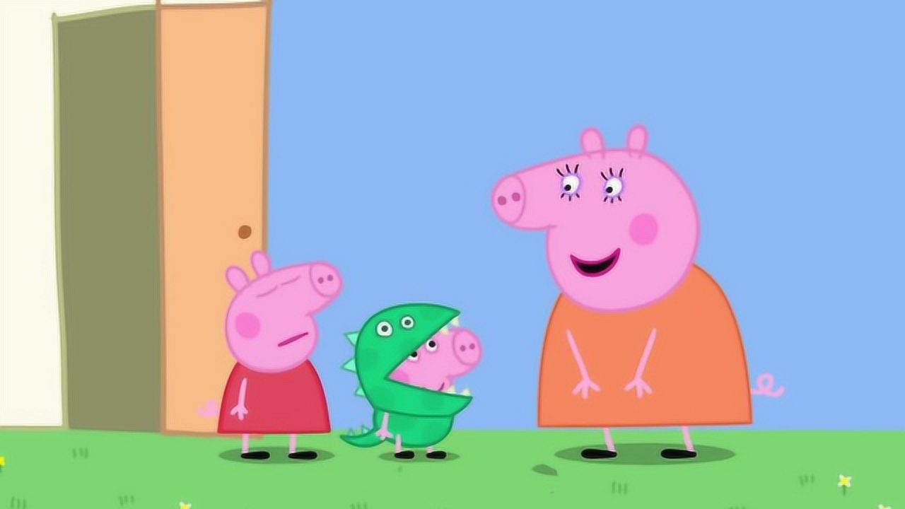 乔治穿着恐龙先生的外套,他喜欢恐龙先生