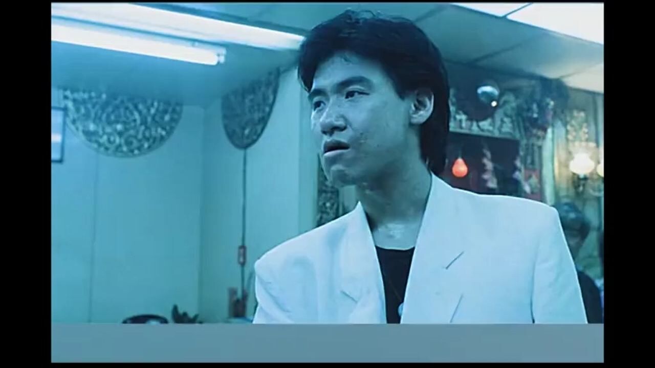 张学友的表情包出处穿西装打领带丫思了勒