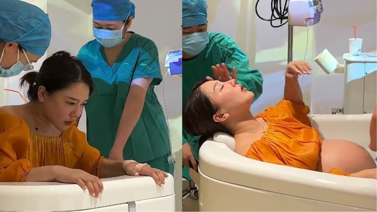 漂亮宝妈蹲坐在水中分娩,紧闭双眼暗自发力,医生护士全程陪护