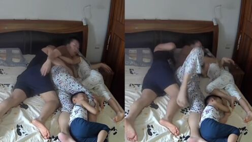 女子睡觉被丈夫孩子前后夹击，还被另一个孩子抱着大腿，女子崩溃