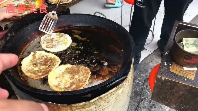 安徽宿州萧县最彪悍的一种早餐油盒子配大蒜头