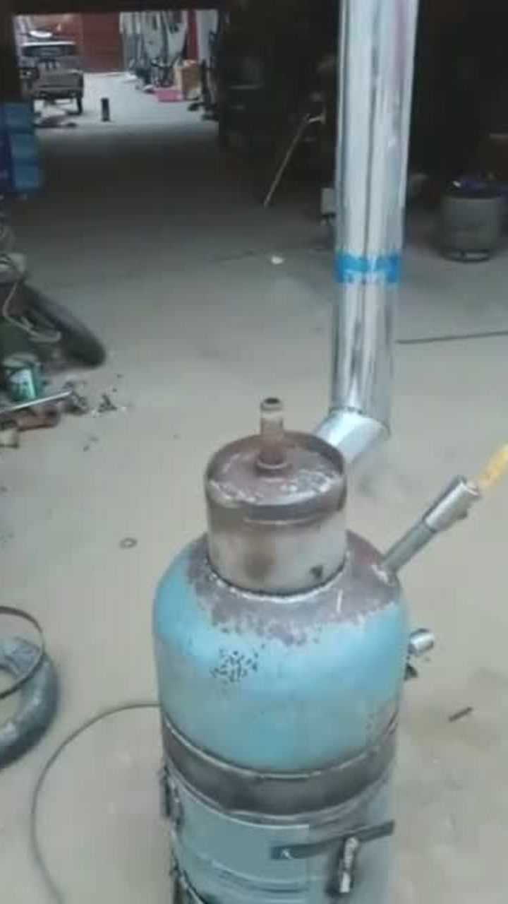 煤气罐制作的取暖炉图片