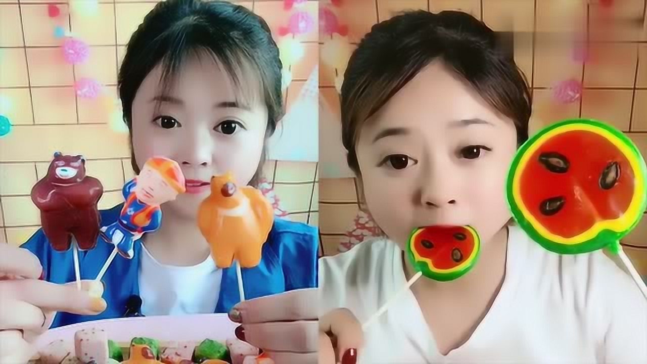 美女直播吃卡通人物糖西瓜棒棒糖看着就过瘾一口下去超满足