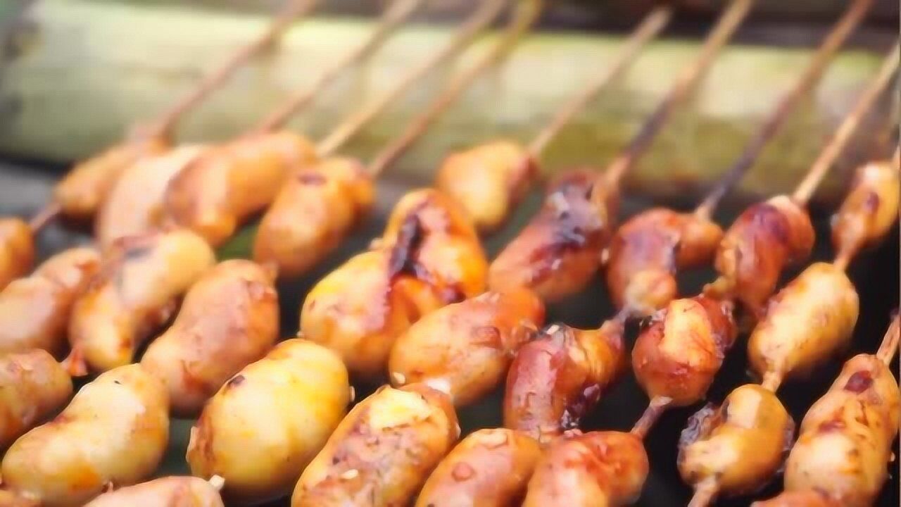 2斤鸡腰子放火上一烤撒上孜然辣椒面香辣入味吃了念念不忘