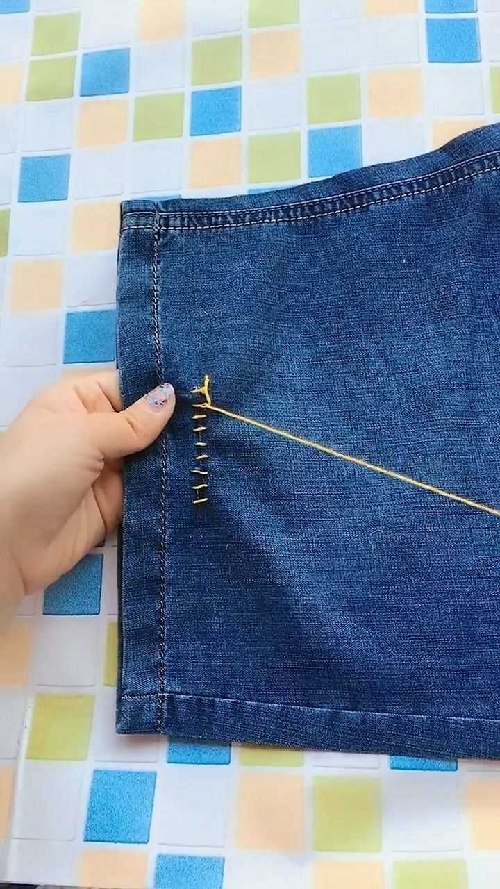 裤子不小心划破了一个口子我们可以用针这样缝制