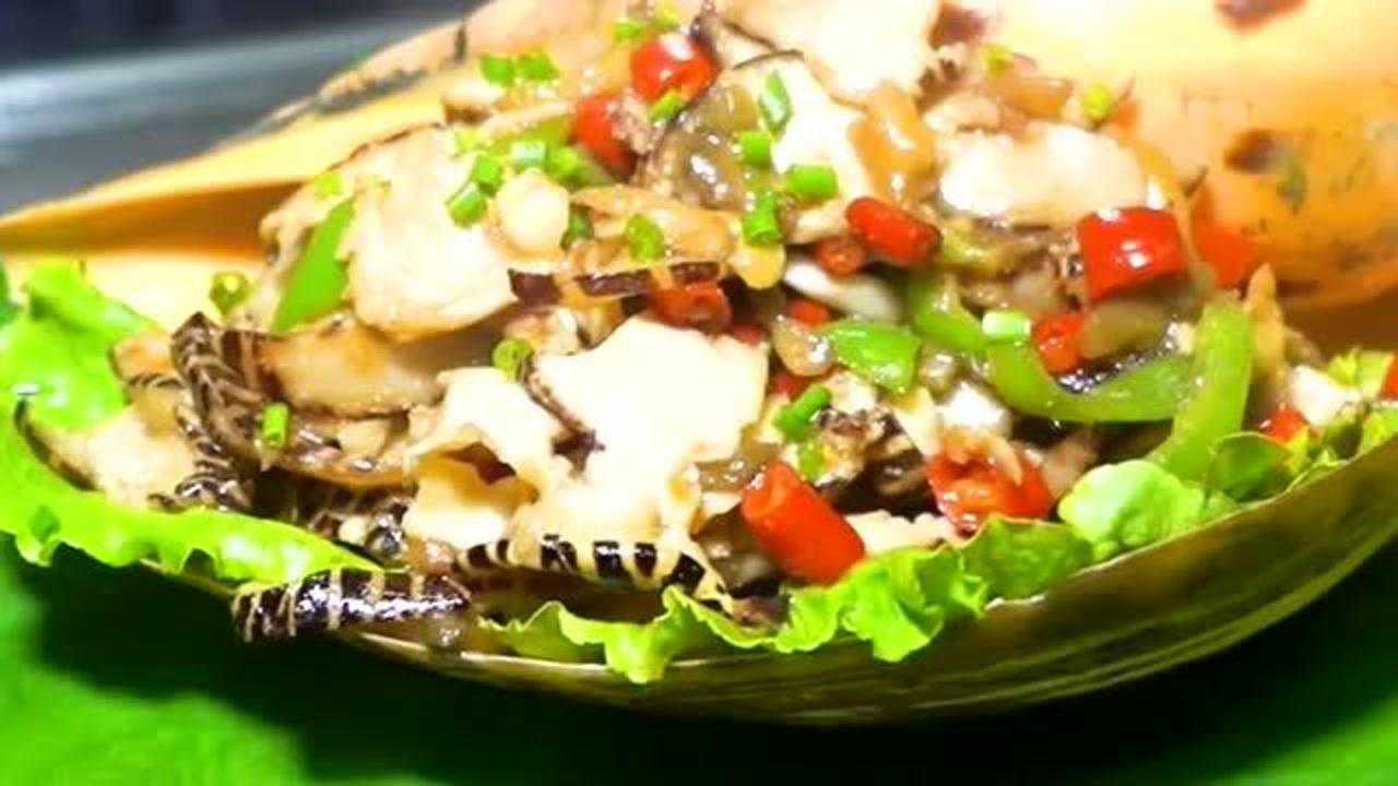用涪陵榨菜爆炒椰子螺搭配进口小米辣椒太下酒了