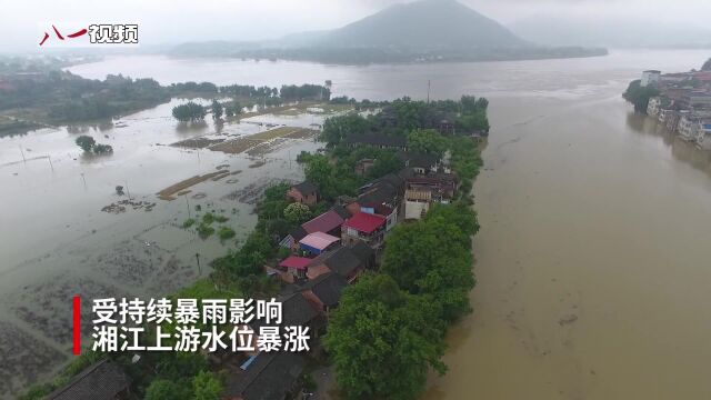 洪峰过境造危情 军地携手保民安