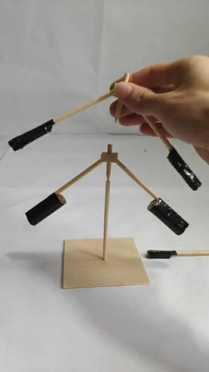 把重心降到支点以下这就是不倒翁的原理