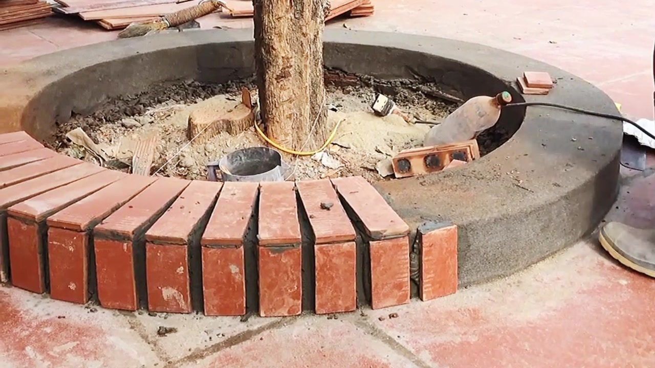 这样用红砖做的的花池效果可非同一般