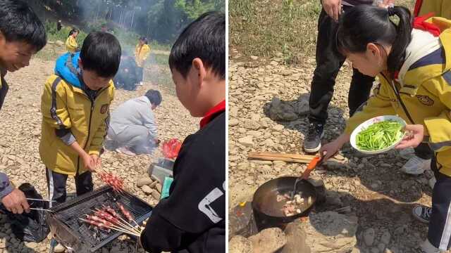 优秀!小学生春游动手做饭 烧烤、炒菜、炖鱼样样行