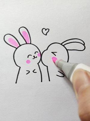 画两只开心的小兔子有没有被甜到简笔画