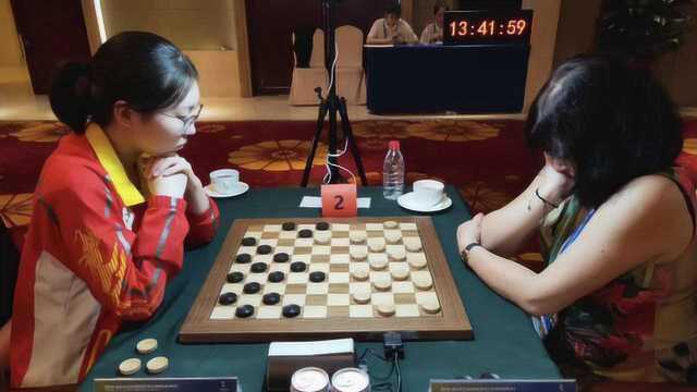 为躲作业学跳棋,女生练成世界冠军,收获中国首枚金牌