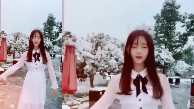 高颜值的美女,在雪地里跳舞,就连背景都像是幕布