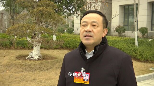 市人大代表、泰晶科技股份有限公司董事长 喻信东