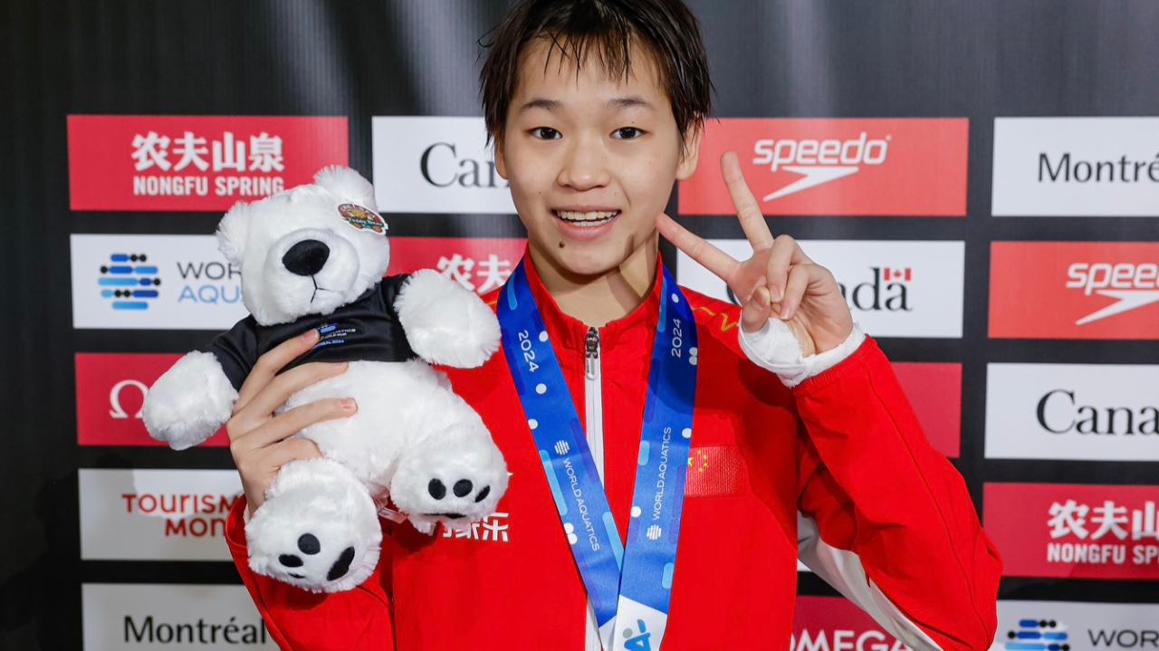 吴敏霞盛赞全红婵个性好:眼里满是赞赏 挡住媒体质问