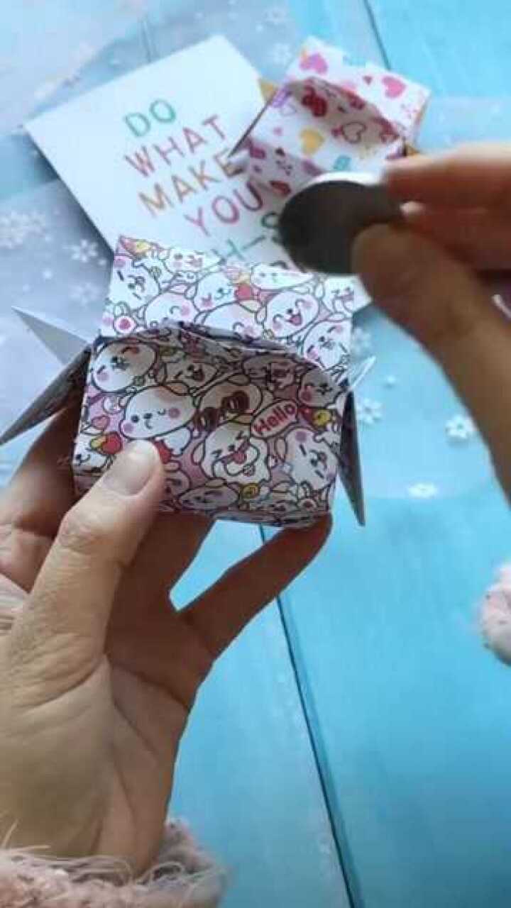 一张纸教你折一个硬币存钱盒,太萌了吧折纸手工238