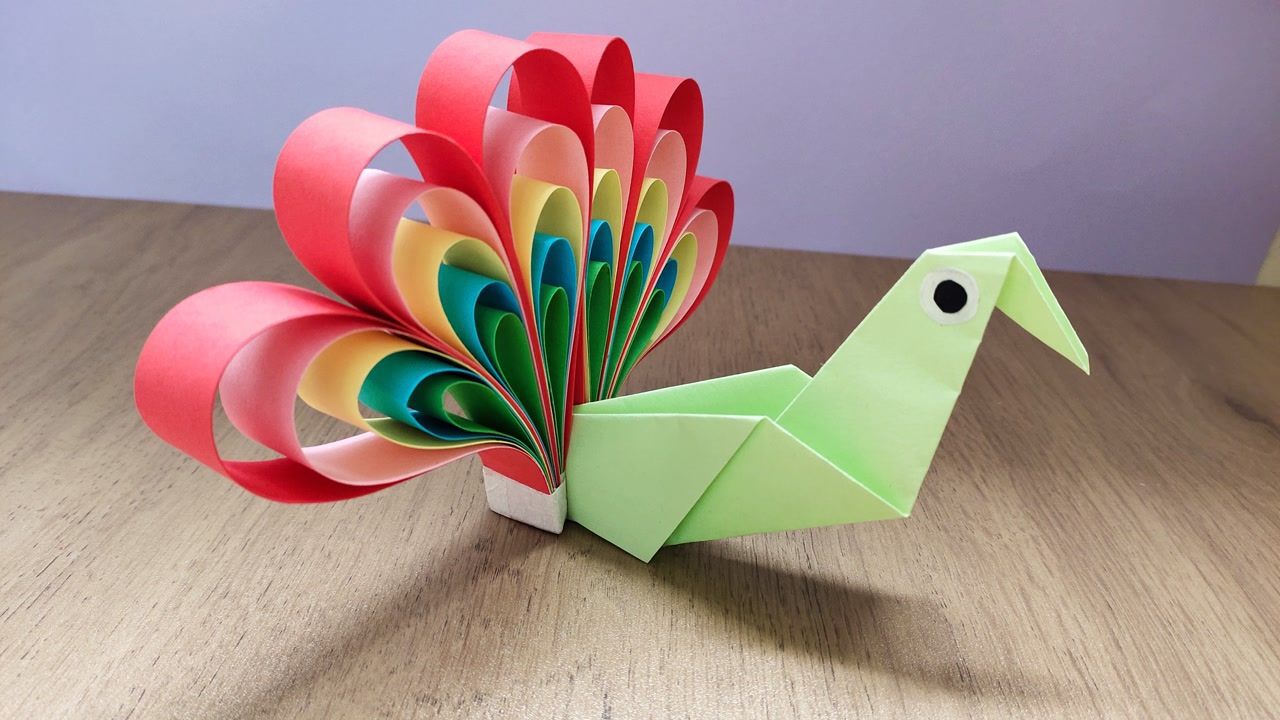 创意少儿手工视频,教你怎么做开屏孔雀折纸,漂亮又简单