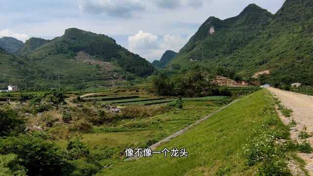 广西大山深处发现一龙头山,前方有一潭水库,这里风景优美