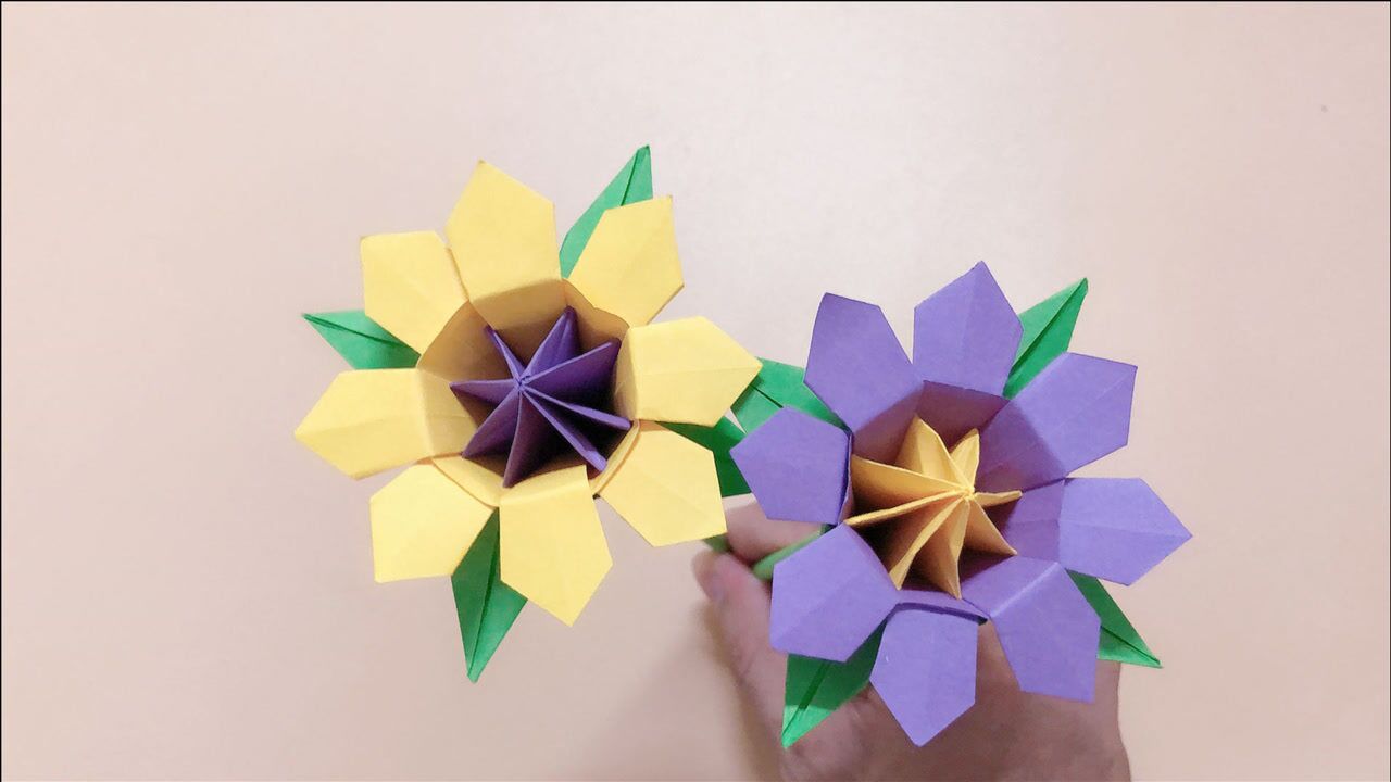 手把手教你折漂亮的花朵,有人知道是什么花吗?手工折纸视频