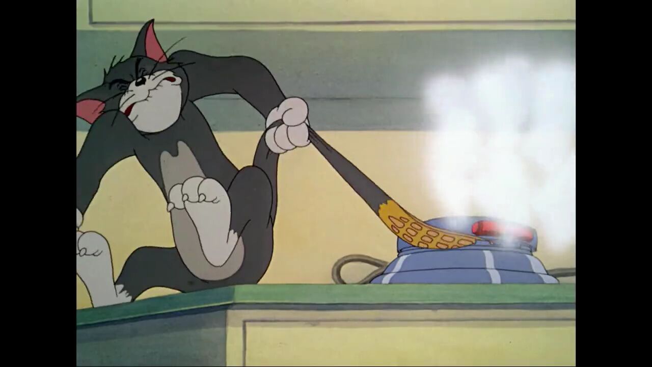 杰瑞拿锤子打汤姆图片