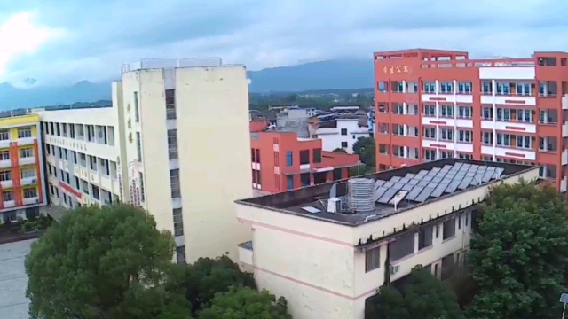 桂林市临桂区五通镇初级中学端午节包粽子活动