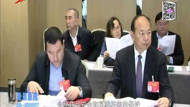 委员热议“两高”报告:基本解决执行难 为公平正义加分