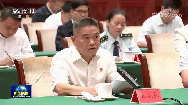 习近平在基层代表座谈会上强调 把加强顶层设计和坚持问计于民统一起来