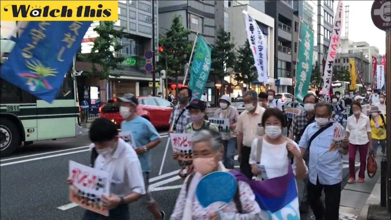 日本民众上街游行抗议举办奥运:不花心思解决疫情 不考虑我们的诉求_腾讯视频