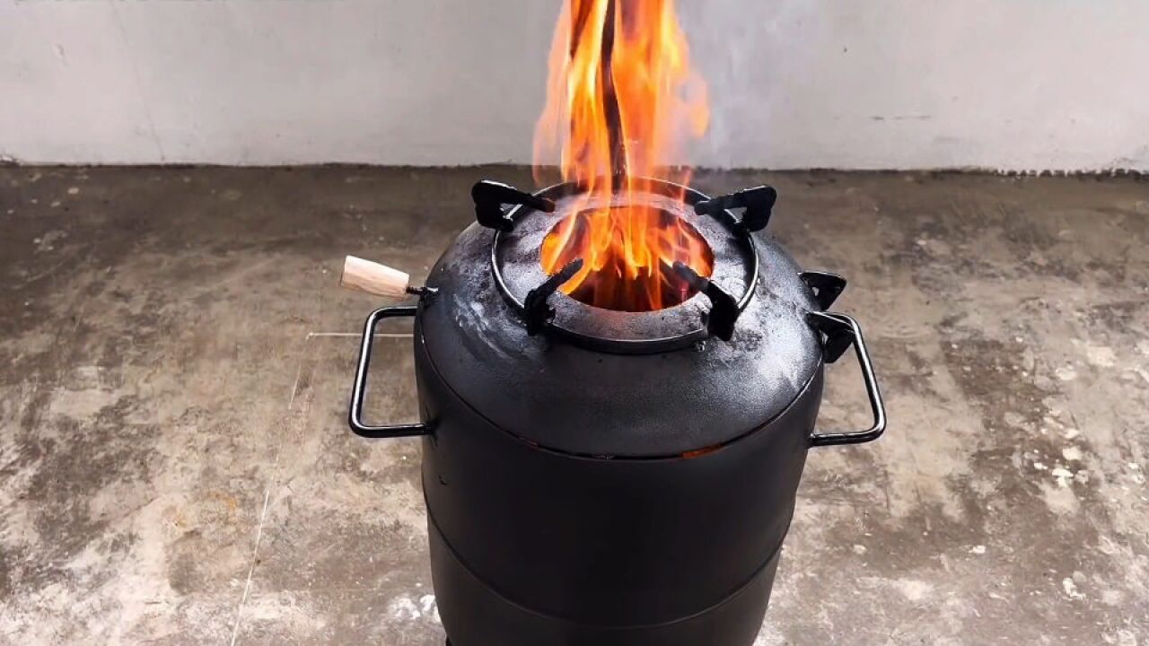 液化气罐制作柴火炉,煤气罐做的柴火灶_大山谷图库