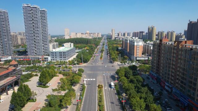 河南民权县整洁的人民路高楼大厦林立道路两侧美丽街景随拍