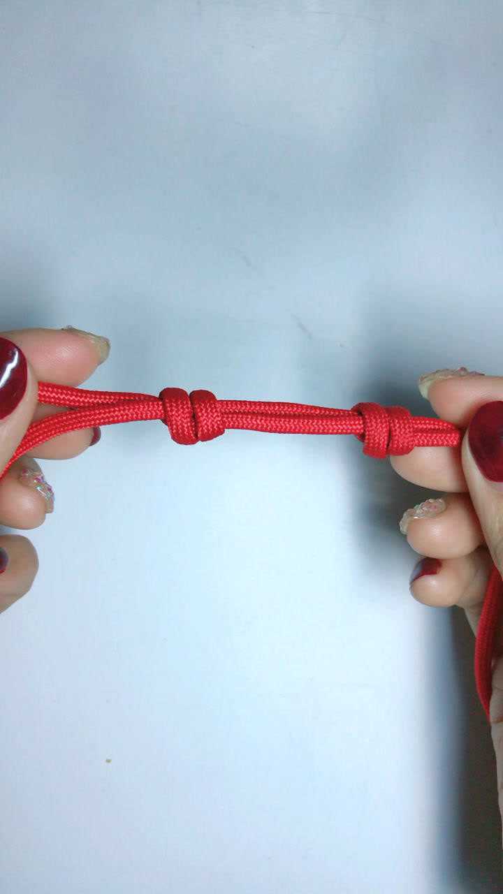 红绳手链收尾伸缩活结图片