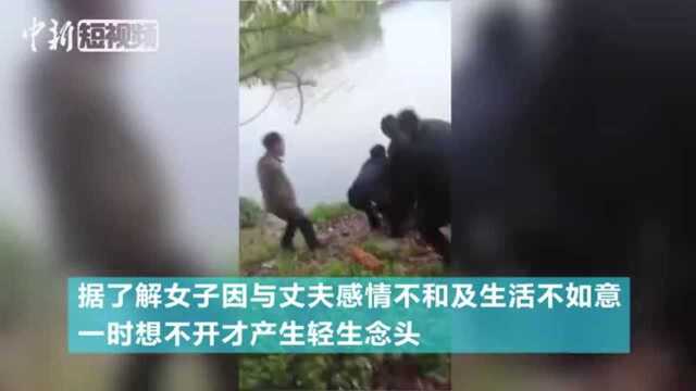 女子抱着8岁小孩跳河冰河中男孩哭喊:妈妈我冷