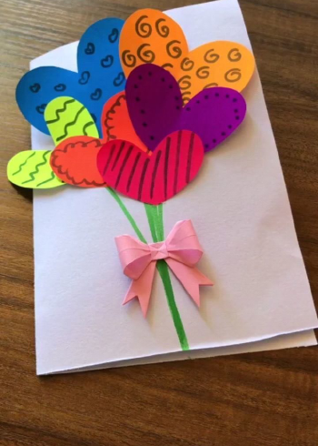 手工蝴蝶结教程装饰贺卡封面很好看哦这个封面的做法是不是一目了然用