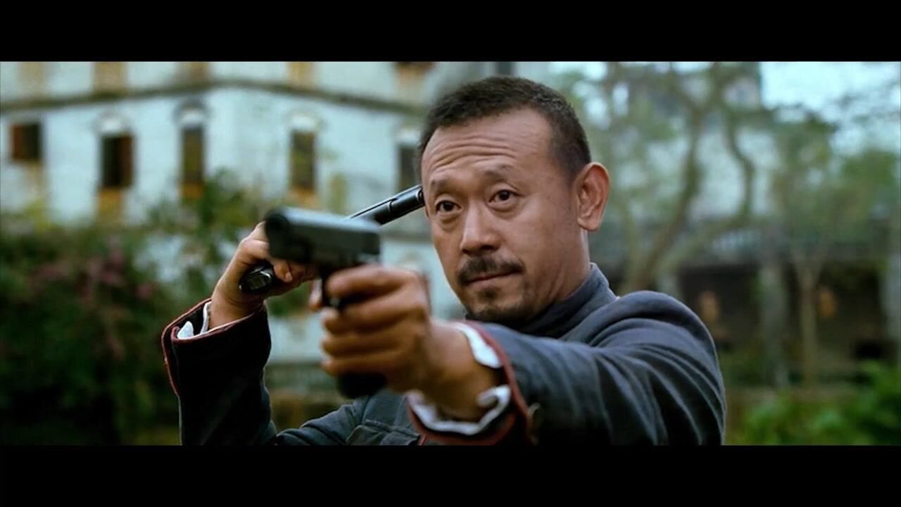 《让子弹飞》张麻子送枪的方式