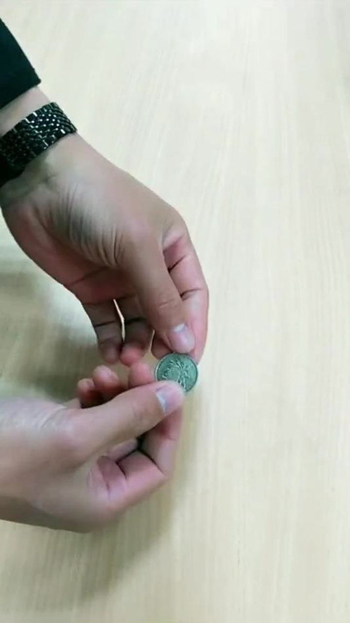 魔术教学:空手变硬币