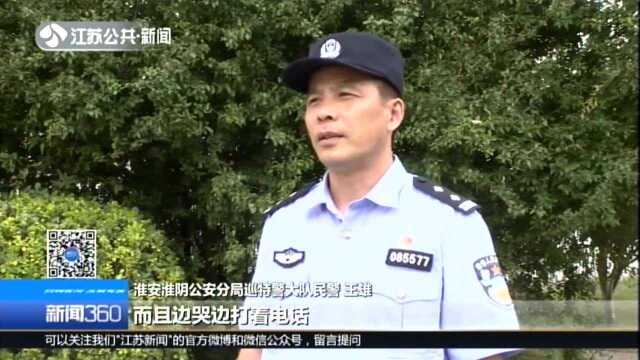 淮安:女子坐上大桥护栏 民警飞身一抱化解险情