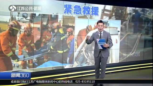 镇江丹阳:两车相撞一人被困 众人抢出生命空间