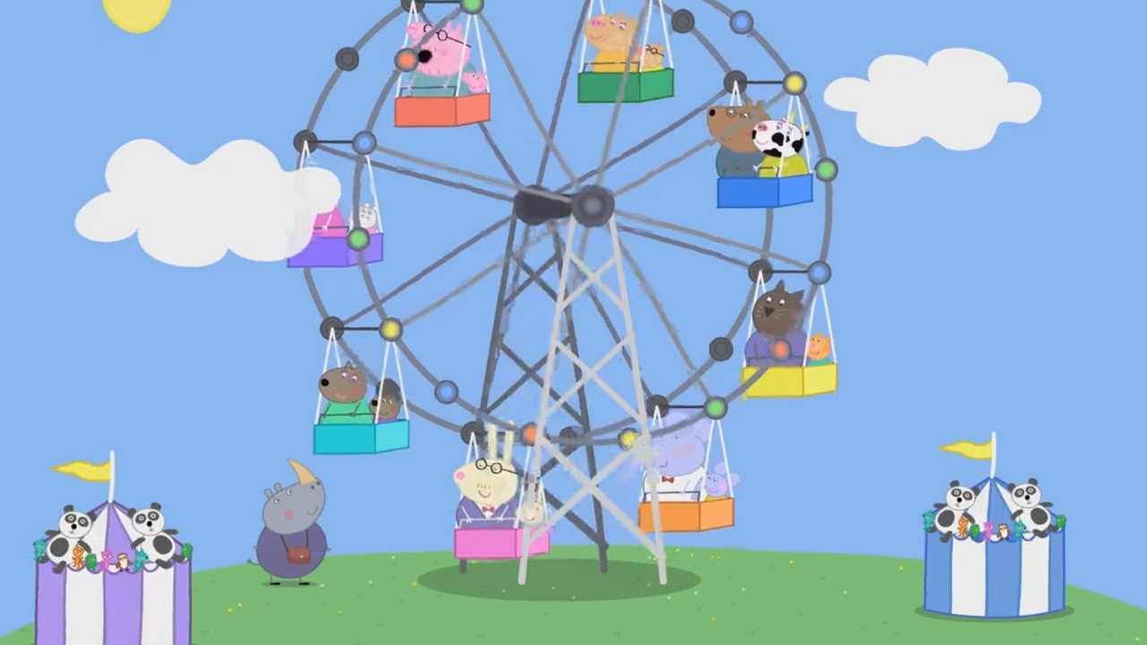 小猪佩奇和小猫咪在摩天轮下面玩耍,小喵咪和佩奇非常开心