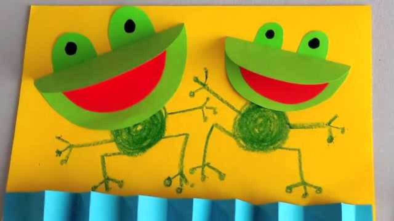 幼儿手工折纸diy简单好做的大嘴巴青蛙贴画圆形纸