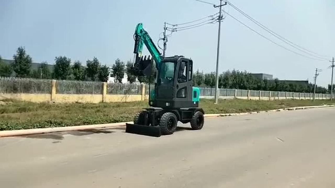 轮式的挖掘机工程挖沟机_腾讯视频