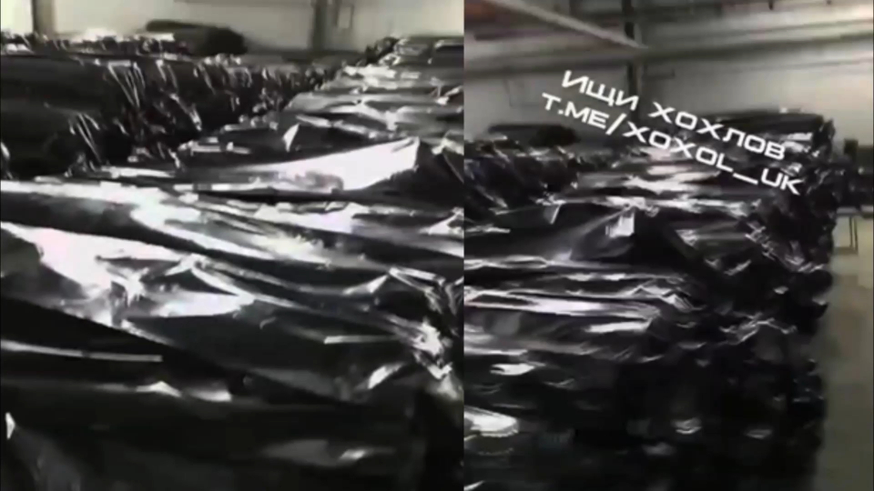 乌军尸体被装进裹尸袋中,整整齐齐码在一起