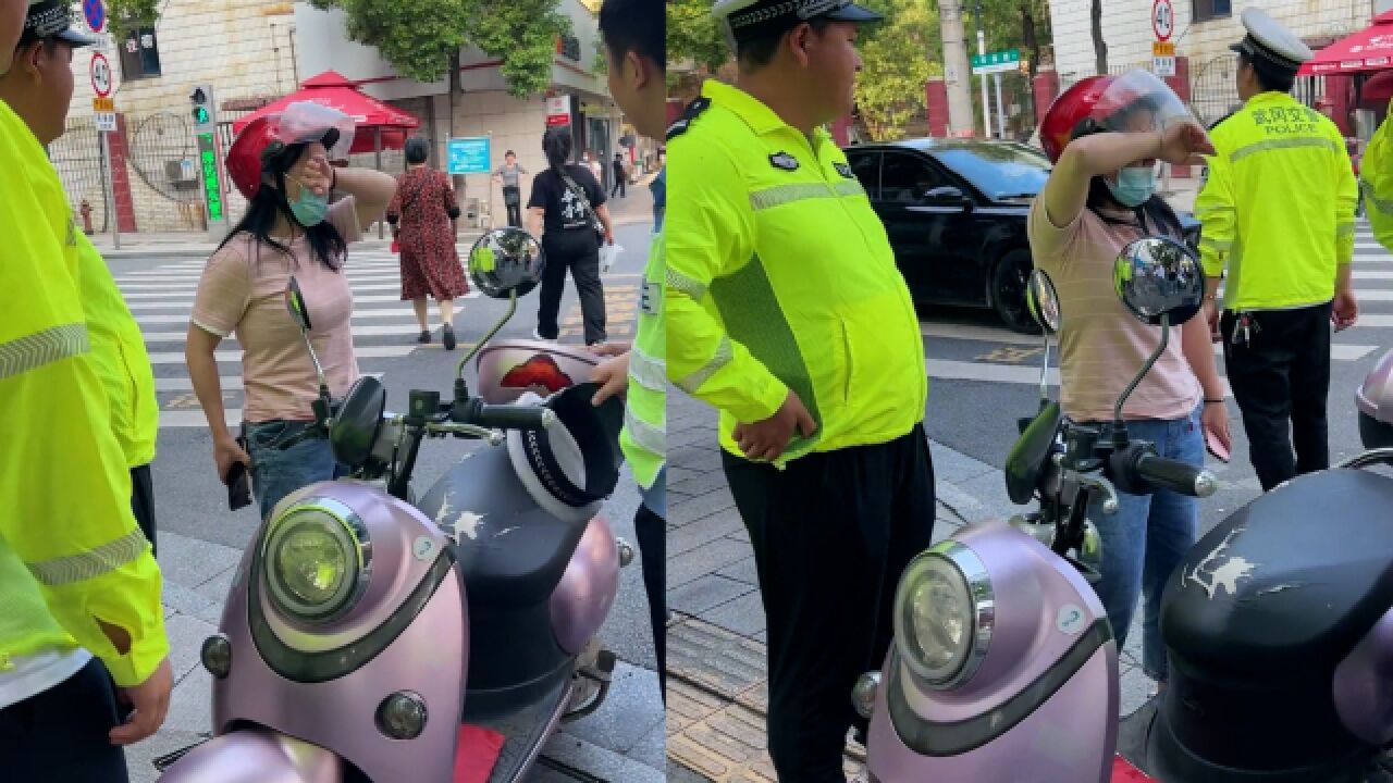 女子无证驾驶电动车被交警拦下,现场边哭边说:你们太欺负人了
