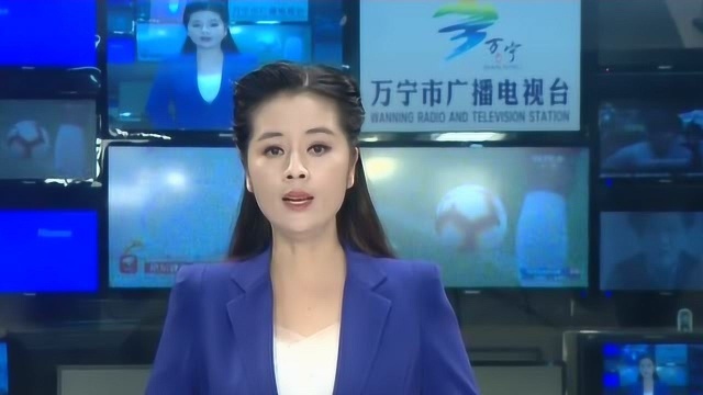 万宁市消防大队指战员到兴隆热带花园与道德模范郑文泰交流座谈