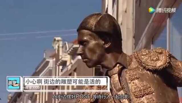 高端行为艺术?这些雕塑全都是真人假扮!全城300多个!