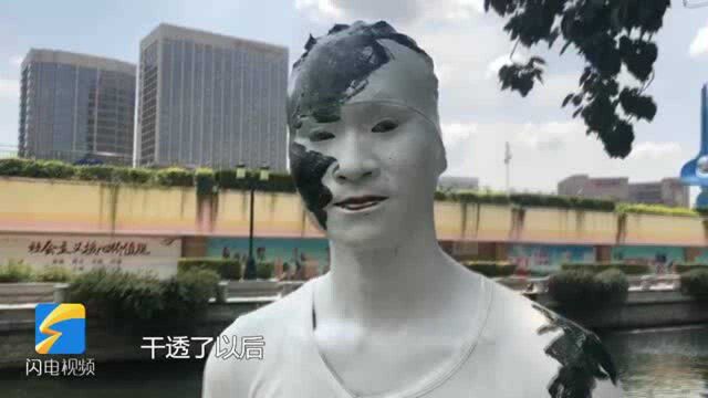 75秒丨用画笔练就“隐身术” 济南小伙在泉城广场“消失”