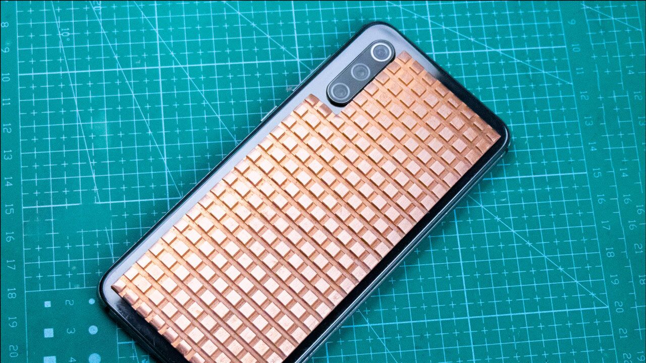 给手机加一个铜散热片 效果还挺好